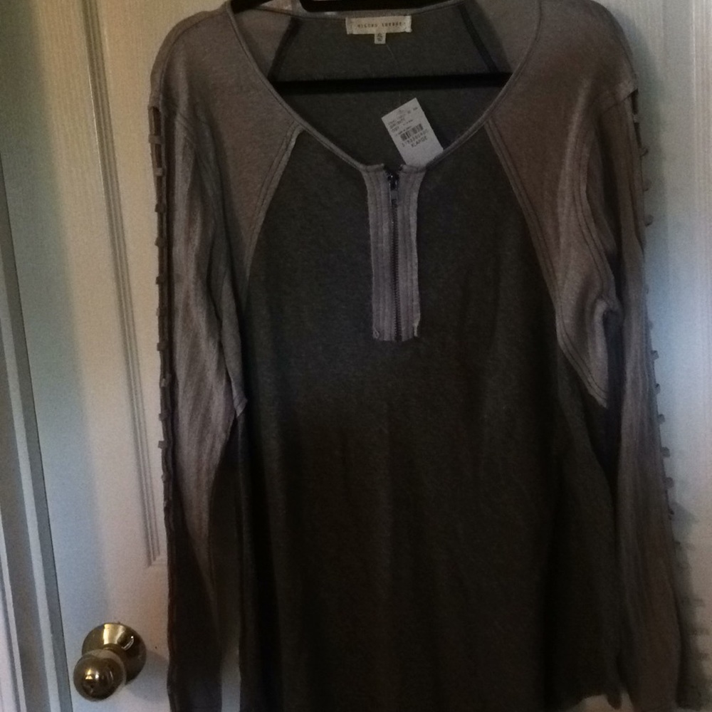 NWT Woman’s long sleeved top.